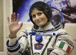 Italian astronaut Samantha Cristoforetti, crew member of the mission to the International Space Station, ISS, waves prior to the launch of Soyuz-FG rocket at the Russian leased Baikonur cosmodrome, Kazakhstan, Sunday, Nov. 23, 2014.  (AP Photo/Dmitry Lovetsky)